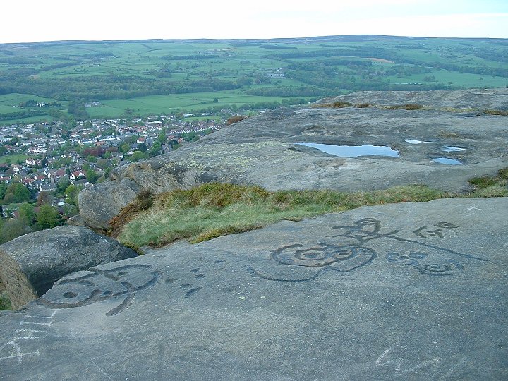 Hanging Stones (Cup and Ring Marks / Rock Art) by Chris Collyer