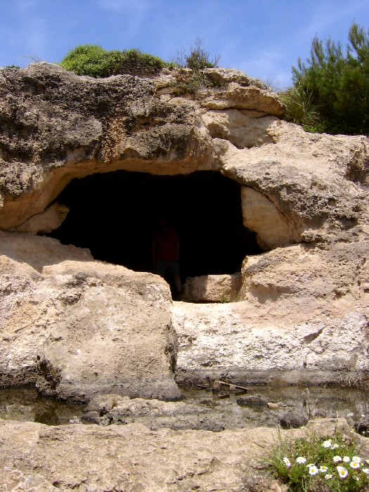 Cala Morell Necropolis (Rock Cut Tomb) by sals